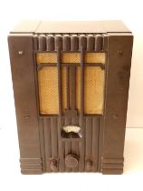 A Tecalemit art deco brown bakelite radio, 16.5" high - workings a/f.