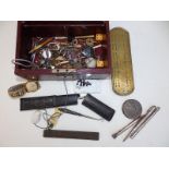 A jewellery box containing watches, silver pencils and other collectors' items.