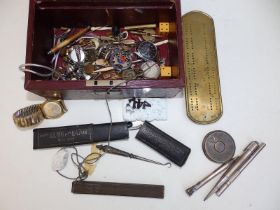 A jewellery box containing watches, silver pencils and other collectors' items.