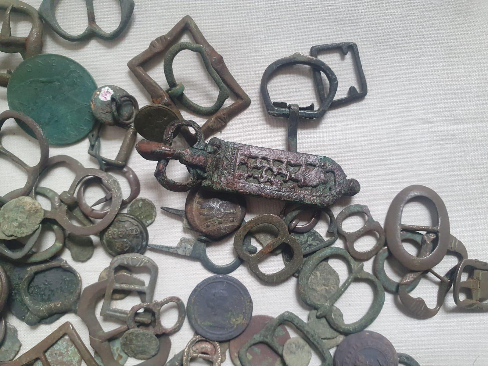 A collection of excavated artefacts including a Saxon and medieval buckles, Roman coins and other - Image 2 of 5