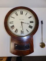 A Victorian mahogany cased drop dial wall clock with fusee movement, the repainted dial marked 'John