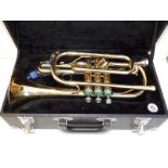 An Earlham brass trumpet in fitted case.