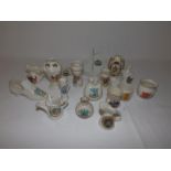 A collection of 17 small pieces of crested china.
