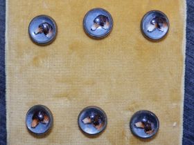 A set of six small Essex crystal dog head buttons, 12mm diameter.