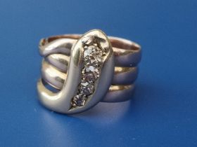 A Victorian diamond set 18ct gold coiled serpent ring, London marks for 1859. Finger size O/P.