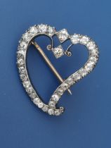 An old cut diamond set 'witches' heart' brooch, of open design, 1".