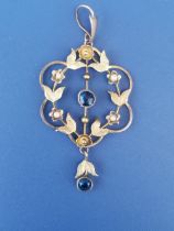 A '9ct' seed pearl set pendant of open garland form, 1.75".