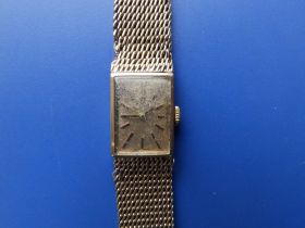 A lady's 9ct gold Omega rectangular dial bracelet wrist watch - dial & bracelet a/f.