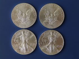 Four modern USA silver dollar 1oz coins - 2015