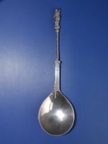 A continental silver apostle top spoon, 7.5".