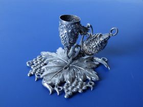 A small early Victorian naturalistic grapevine moulded silver chamberstick with snuffer - Birmingham