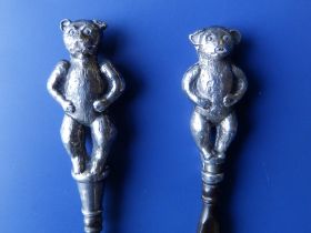 A buttonhook and shoehorn with silver teddy bear handles - C&N, Birmingham 1909, 8.2" - damage to