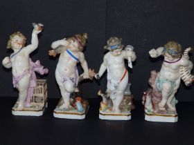 A set of four Samson porcelain figures of putti emblematic of the seasons, pseudo Meissen marks,