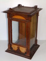 A Victorian walnut table-top display cabinet with single door, Height 16.5", Width 11" overall.