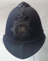 A vintage Metropolitan Police helmet.