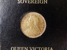 A cased Victorian gold sovereign, 1896.