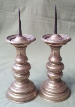 A pair of antique bellmetal pricket candlesticks with iron prickets, 13.5". (2)