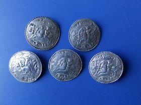 A set of five Berthold Muller silver buttons, cast decoration depicting two musicians within