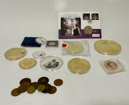 A collection of large commemorative coins and medallions, some gold plated and a small collection of