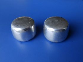 A pair of Georg Jensen silver salt & pepper pots of plain squat cylinder form, pattern No.1135, 1.