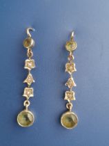 A boxed antique pair of peridot & seed pearl set 9ct drop earrings, 1.25". (2)