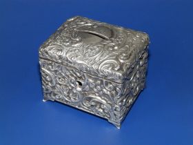 An Edwardian embossed silver rectangular money box with hinged cover - HM, Birmingham 1903, 2.75"