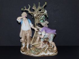 A 19thC Meissen porcelain allegorical figure group after Acier depicting an applepicker with