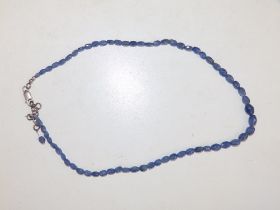 A graduated sapphire faceted bead necklace with 925 clasp, 18".