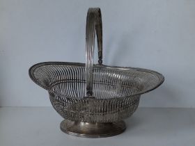 A Dutch silver oval swing-handled basket, maker's mark 'GR', 11.25" across - a/f.