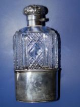 A late Victorian silver mounted cut glass hip flask - LAL, London 1895, 6".