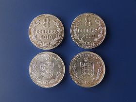 Four modern silver Guernsey 8 Doubles coins, 2010.