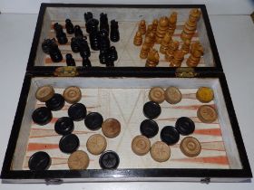 A Victorian games box with wooden chess & draughts sets, the box 14" across.