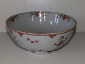 An antique Chinese famille rose porcelain bowl decorated flowers, 10.25" diameter - two hairline
