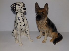 A large Beswick seated dalmatian 2271, 13.5" high and an alsatian 2410. (2)