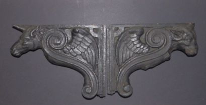 A pair of ebonised wood corbels believed to have been removed during the dismantling of the premises