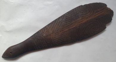A Maori wood Patu, decorated on both sides, 17.75".