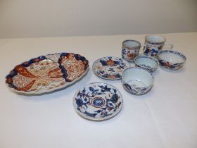 Three 18th/19thC Oriental Imari coloured tea bowls, two cups, two saucers and a Japanese Imari 8.