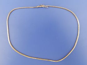 A modern 9ct gold necklace, 15.75".