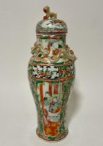 A 19thC Chinese Cantonese porcelain vase & cover of slender baluster form, 10.5" high - rim chips.