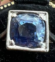 A certified natural 6.72 carat Sri-Lankan sapphire solitaire ring, the square cushion cut stone in