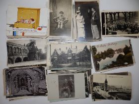 Approximately 100 early 20thC postcards.