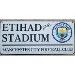 MANCHESTER CITY METAL ETIHAD SIGN AUTOGRAPHED BY RUBEN DIAS