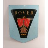 A metal shield shaped Rover advertising