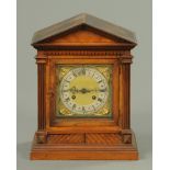 Late 19th century walnut bracket clock, with two train German movement striking on two gongs,