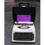 Cased Adler Tippa typewriter