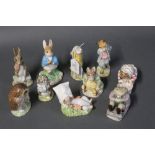 Ten Beatrix Potter figurines by Beswick and Royal Albert