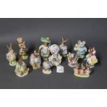 Twelve Beatrix Potter figurines by Royal Albert and Beswick