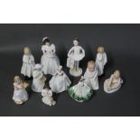 Eleven Royal Doulton figurines