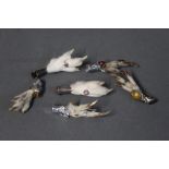 Six Scottish grouse claw brooches