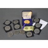 Box of coins, crowns, Isle of Man £1 coins,
